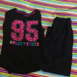 Black multicolored top and black sweats